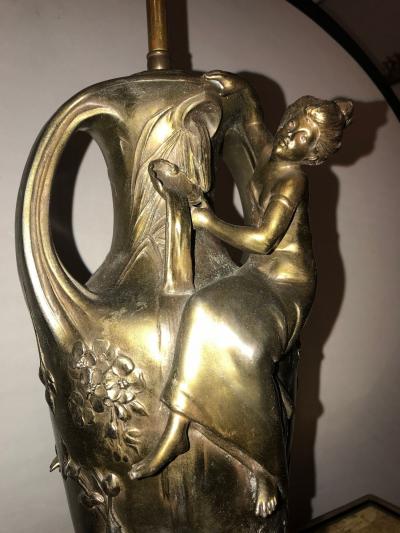 Pair of Art Nouveau Figural Urns Mounted as Lamps