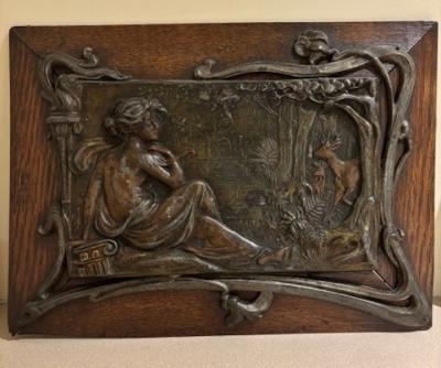 Pair of Art Nouveau Metal and Oak Figural Wall Plaque