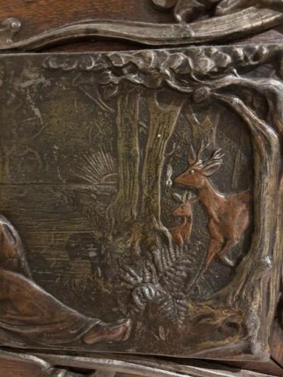 Pair of Art Nouveau Metal and Oak Figural Wall Plaque