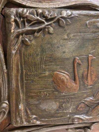 Pair of Art Nouveau Metal and Oak Figural Wall Plaque