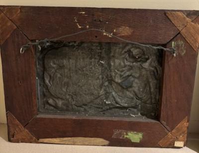 Pair of Art Nouveau Metal and Oak Figural Wall Plaque