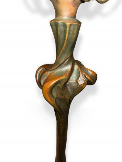 Pair of Art Nouveau candlesticks form lamps with Quezal shades
