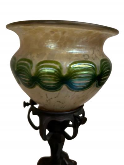 Pair of Art Nouveau candlesticks form lamps with Quezal shades