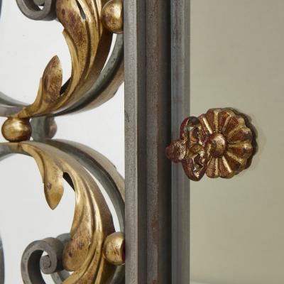 Pair of Art Nouveau gilt metal and steel vitrines