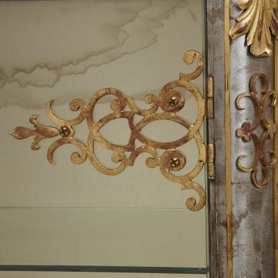 Pair of Art Nouveau gilt metal and steel vitrines