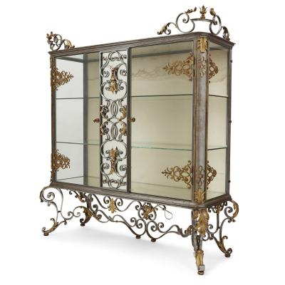 Pair of Art Nouveau gilt metal and steel vitrines