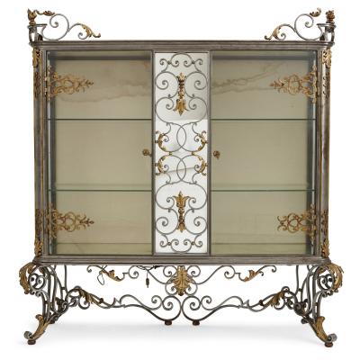 Pair of Art Nouveau gilt metal and steel vitrines