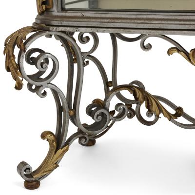 Pair of Art Nouveau gilt metal and steel vitrines