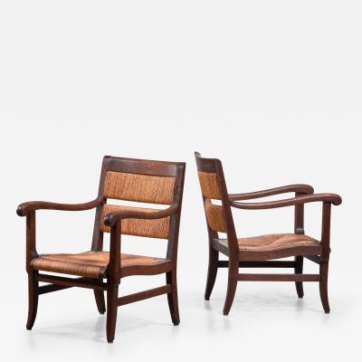 Pair of Arts Crafts armchairs