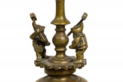 Pair of Arts and Crafts Brass Gnomes and Dwarves Embellished Candlesticks
