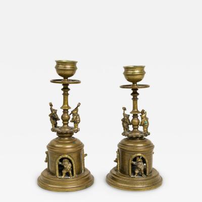 Pair of Arts and Crafts Brass Gnomes and Dwarves Embellished Candlesticks