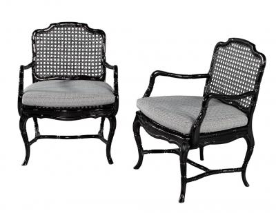 Pair of Black Lacquered Cane Back Lounge Chairs