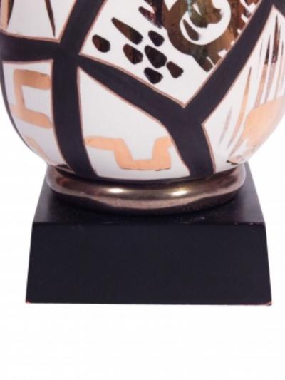 Pair of Black and Gold Ceramic Lamps