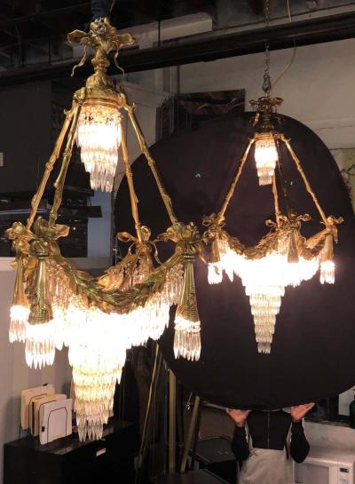 Pair of Bronze Louis XVI Style Crystal Ribbon and Tassle Drapery Chandeliers