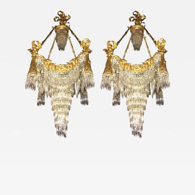 Pair of Bronze Louis XVI Style Crystal Ribbon and Tassle Drapery Chandeliers