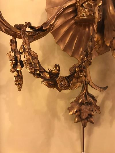 Pair of Bronze Three Light Sconces in an Urn Form