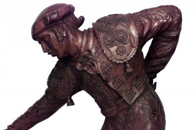 Pair of Carved Pine Toreadors with Red Capes