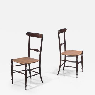 Pair of Chiavari chairs with ebonized beech frame Italy