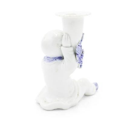 Pair of Chinese Blue and White Porcelain Figural Candlesticks