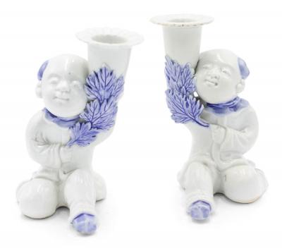Pair of Chinese Blue and White Porcelain Figural Candlesticks