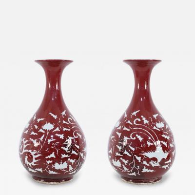 Pair of Chinese Burgundy and White Botanical Motif Porcelain Vases