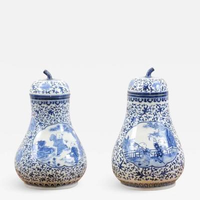 Pair of Chinese Export Blue and White Pear Shaped Porcelain Lidded Vases