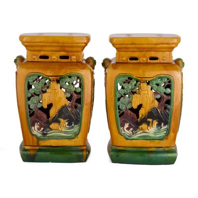 Pair of Chinese Sancai glazed earthenware seats