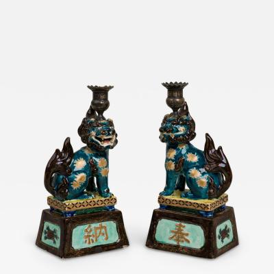 Pair of Chinese Style Decorative Porcelain Foo Dog Candlesticks