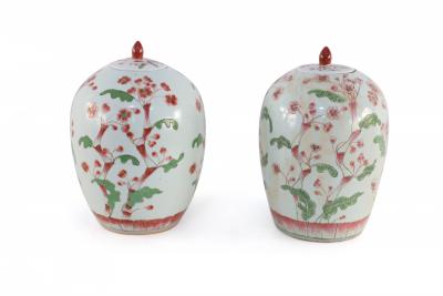 Pair of Chinese White and Pink Cherry Blossom Motif Lidded Porcelain Urns