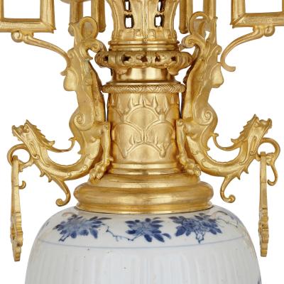 Pair of Chinese porcelain and French Chinoiserie style gilt bronze candelabra