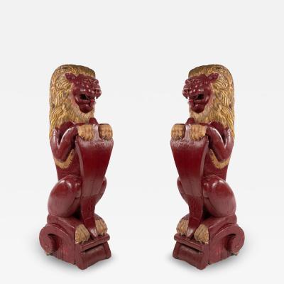 Pair of Continental Dutch Red Painted Pine Lions