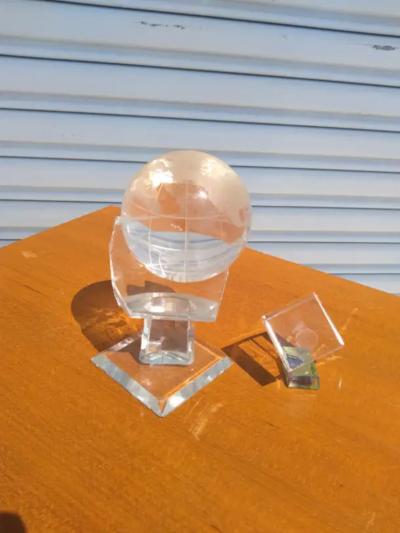 Pair of Crystal Globes on Lucite Stand and Etched Cube