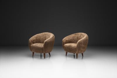 Pair of Curved Armchairs with Tapered Wooden Legs Europe Mid 20th Century