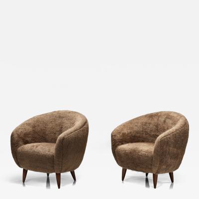 Pair of Curved Armchairs with Tapered Wooden Legs Europe Mid 20th Century