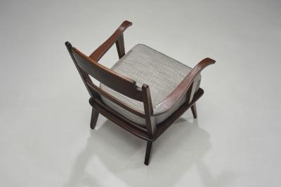 Pair of Dark Stained Pine Armchairs Europe First half of the 20th century