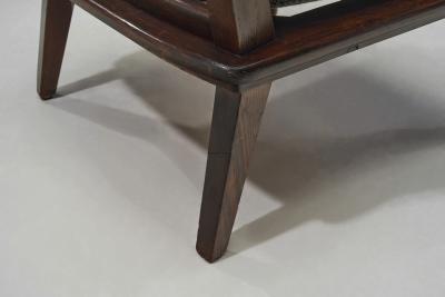 Pair of Dark Stained Pine Armchairs Europe First half of the 20th century