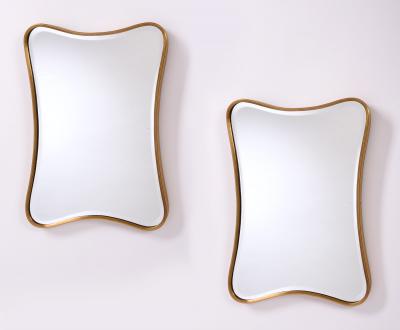 Pair of Diminutive and Charming Shaped Ribbed Brass Mirrors Italy 1950s