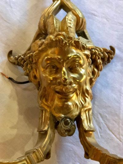 Pair of Dore Bronze Sconces Having Horned Bacchus Masks in Louis XVI Style