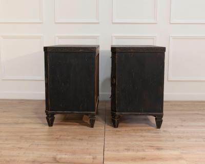 Pair of Early 20th Century Black Painted Chests with Carved Detail