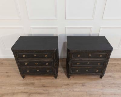 Pair of Early 20th Century Black Painted Chests with Carved Detail