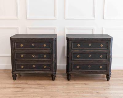 Pair of Early 20th Century Black Painted Chests with Carved Detail