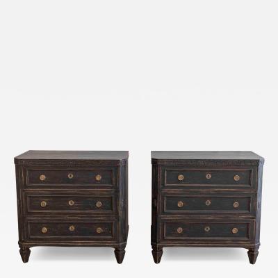 Pair of Early 20th Century Black Painted Chests with Carved Detail