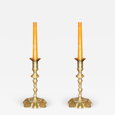 Pair of Early Queen Anne Brass Candlesticks