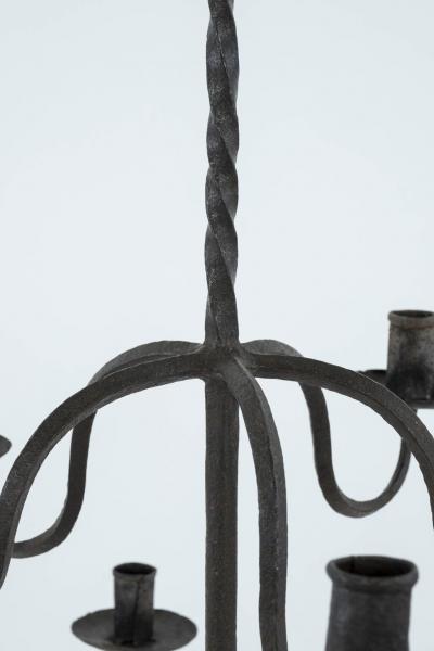 Pair of Early Two Tier Forged Iron Chandeliers