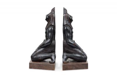 Pair of Egyptian Carved Ebonized Kneeling Figures