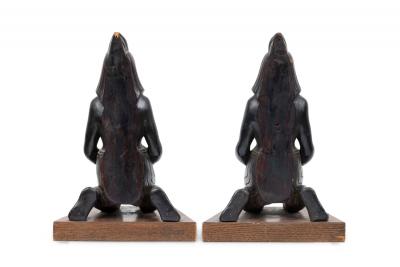 Pair of Egyptian Carved Ebonized Kneeling Figures