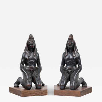Pair of Egyptian Carved Ebonized Kneeling Figures