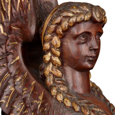 Pair of Egyptian Revival carved and gilt wooden pedestals