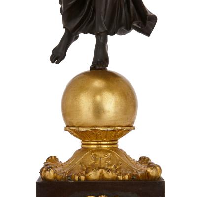 Pair of Empire period gilt and patinated bronze candelabra