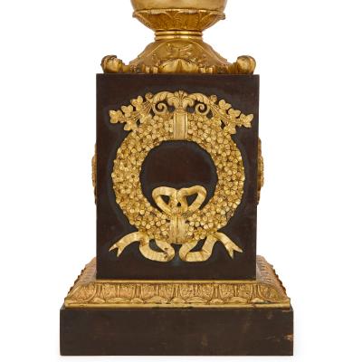 Pair of Empire period gilt and patinated bronze candelabra